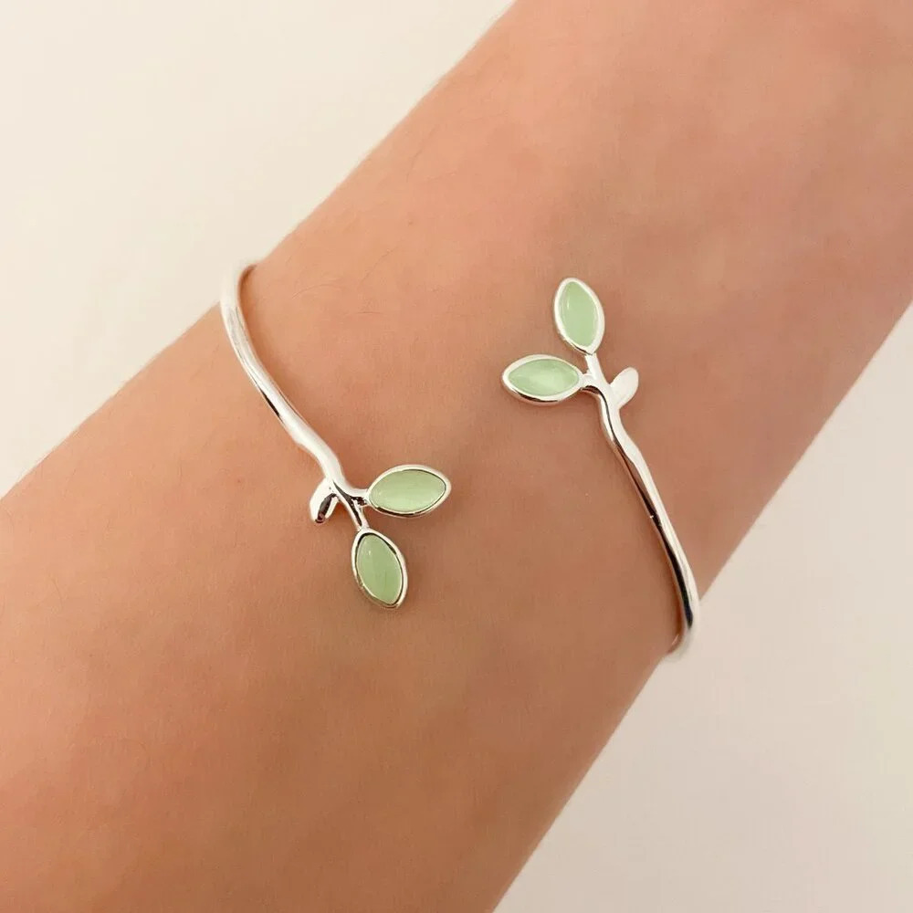Delicate Silver Cuff Bracelet with Light Green Leaf Accents